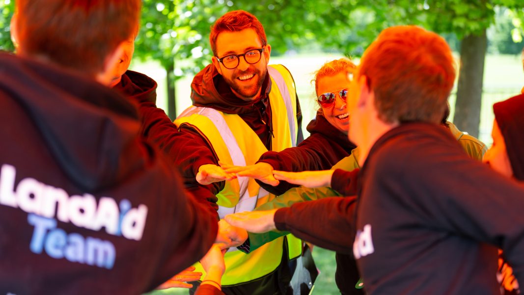 LandAid staff in a team talk