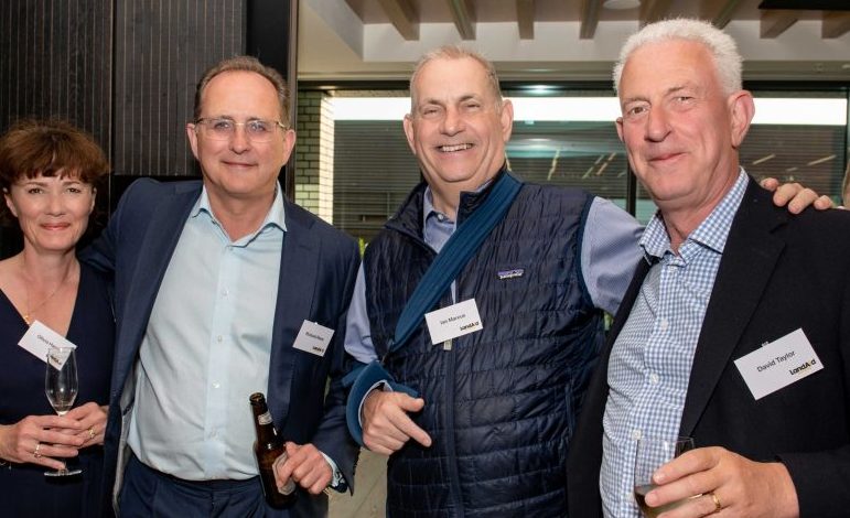 four charity patrons at an event.